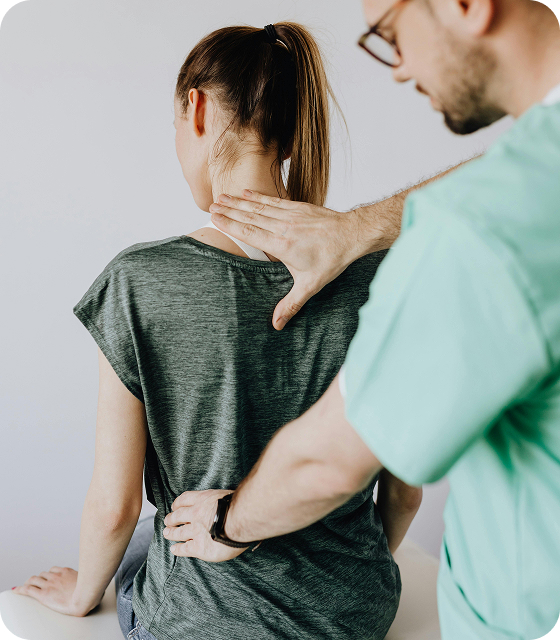 Physical therapist treating patient